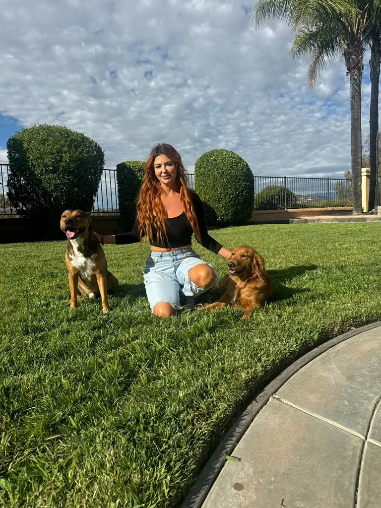 The behaviorist with two of her own dogs, Temecula, CA